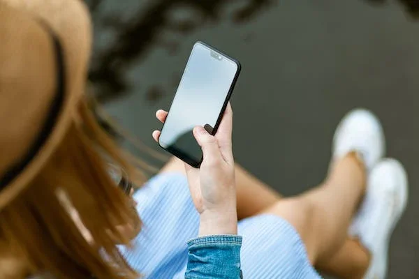 Woman holding phone